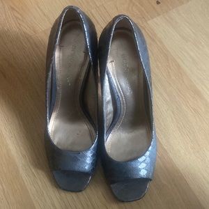 These are gray BCBGeneration heels size 7.